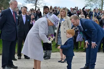 HM The Queen receives a bouquet of flowers at the opening of the Centre for Elephant Care at Whipsnade Zoo