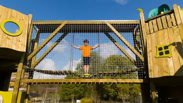 little boy on a bridge in Hullabazoo Adventure Play Whipsnade Zoo