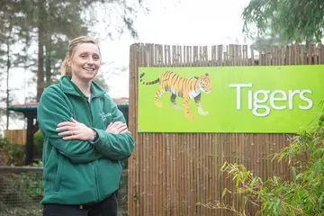 Sarah McGregor, Team Leader of Predators at Whipsnade Zoo stands outside tiger enclosure