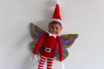 Elf on the shelf with butterfly wings