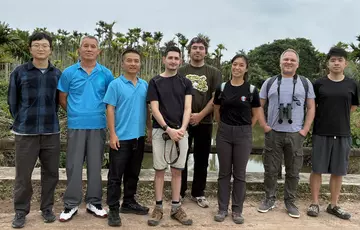 A group of conservationists posing for a photo