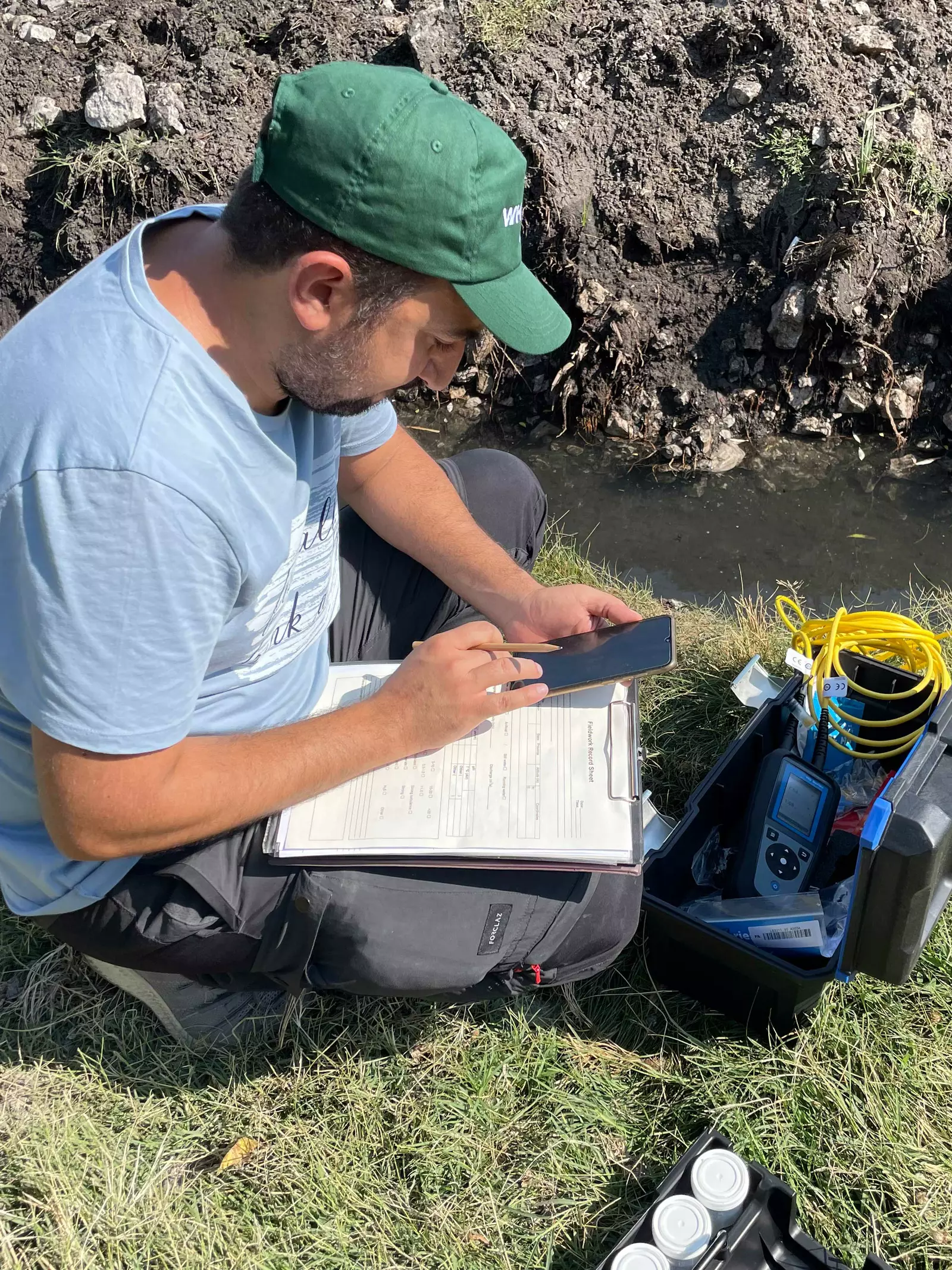 Taking GPS coordinates for a site of interest for conservation field work to save Lake Acıgöl killifish.