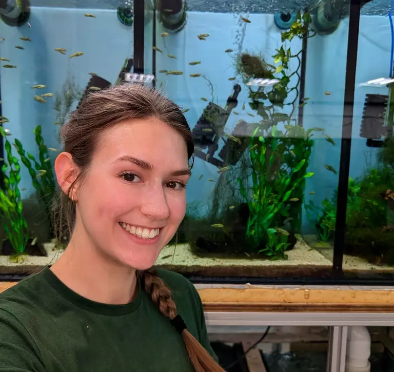 Keeper Lucy and critically endangered fish species